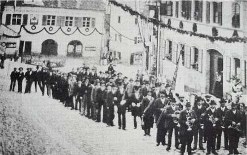 1906 · Burschenzug in der Marktstraße
